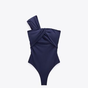 Asymmetrical ruched bathing suit never worn